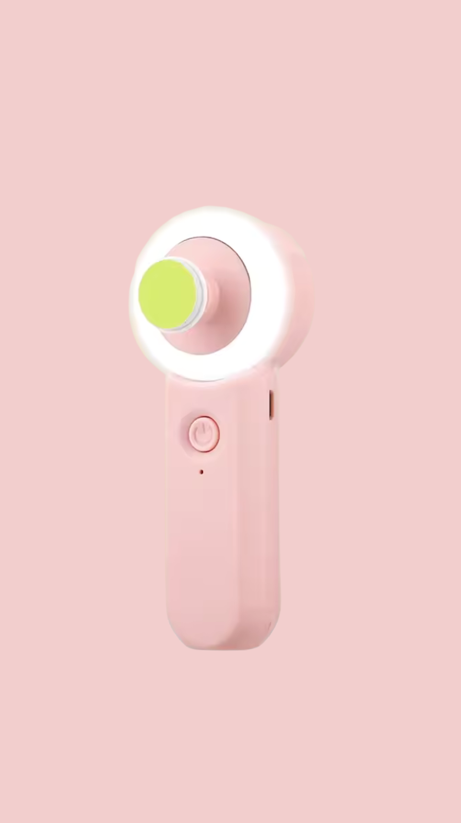 Pink Baby nail trimmer light with a green button on a pink background