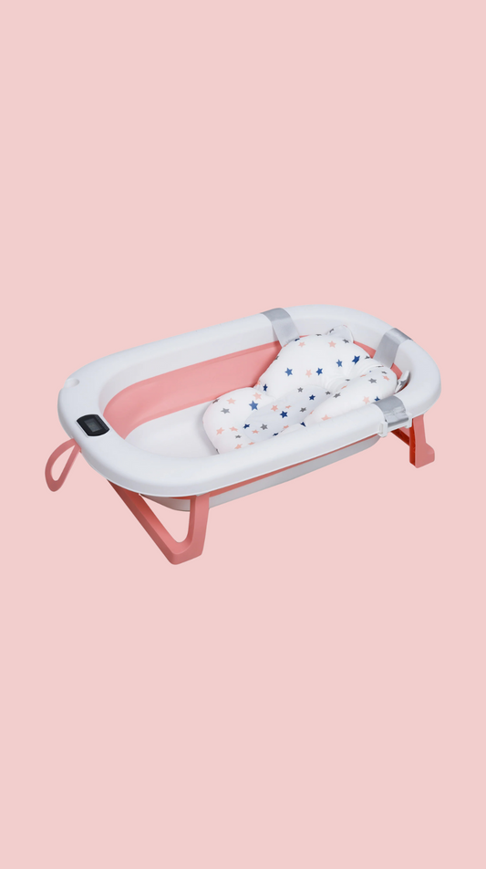 Baby bathtub with pink stand on a light pink background