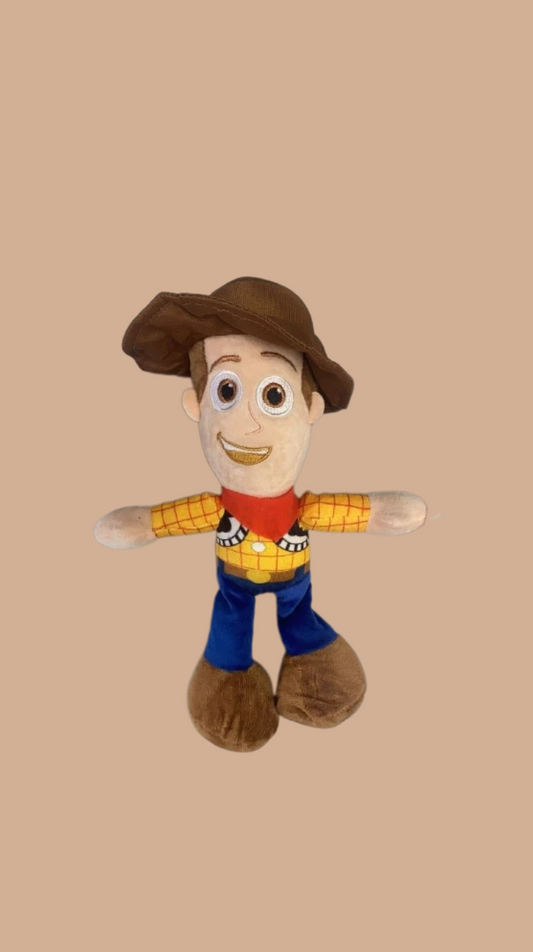 Plush toy resembling a character from a popular animated movie on a beige background